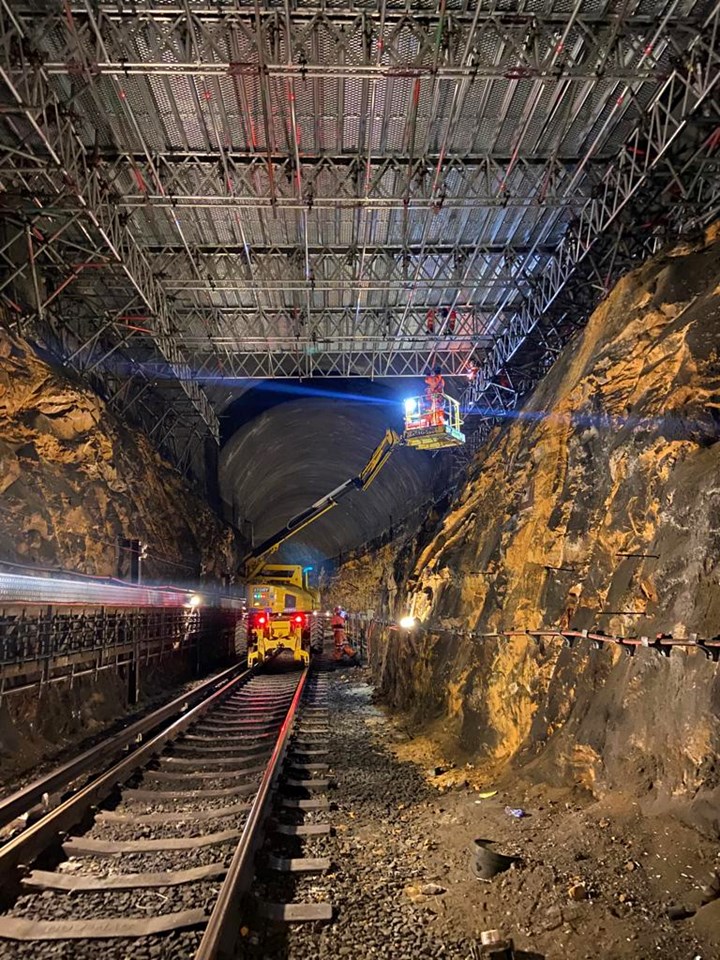 Checks being carried out to underside of scaffolding deck in Liverpool High Neck tunnel