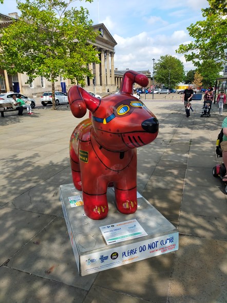 The Kirklees Rocket Snowdog outside Huddersfield Station