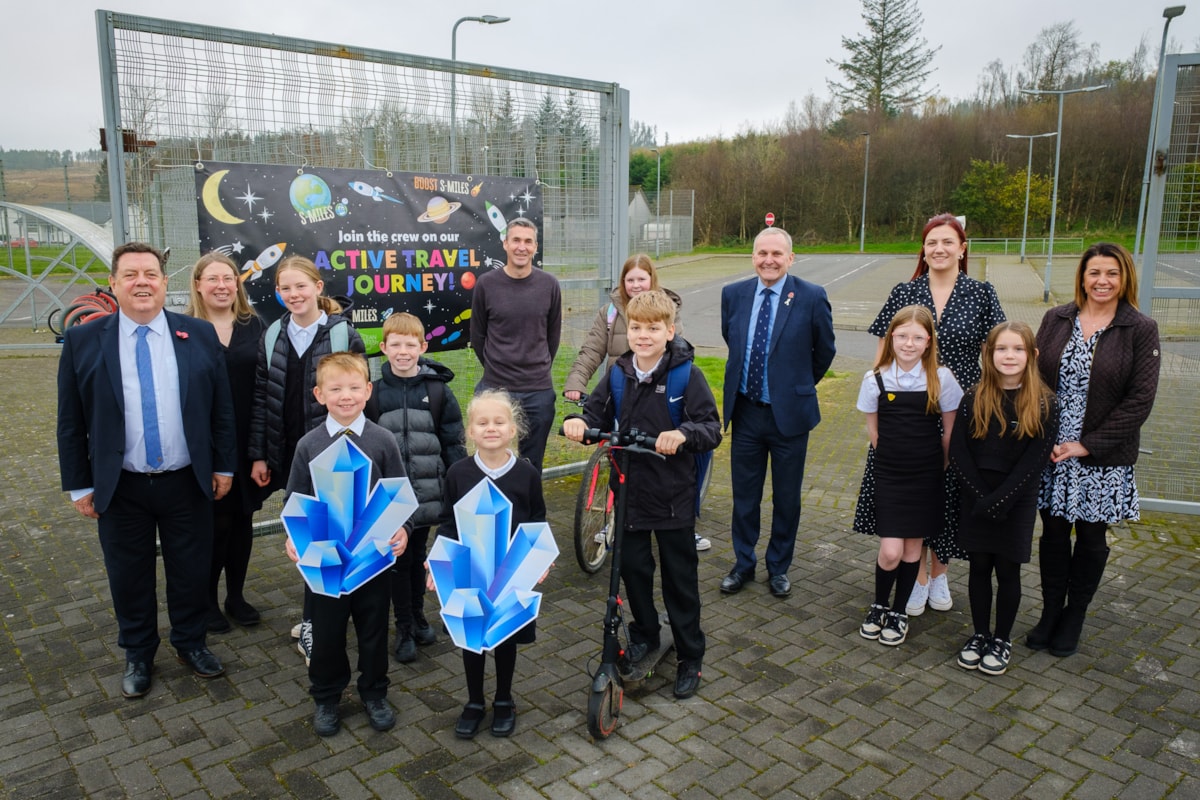 Lewis and Luna hold the cosmic crystals at the launch of Shoot to Saturn attended by Councillors McMahon, Barton and Reid