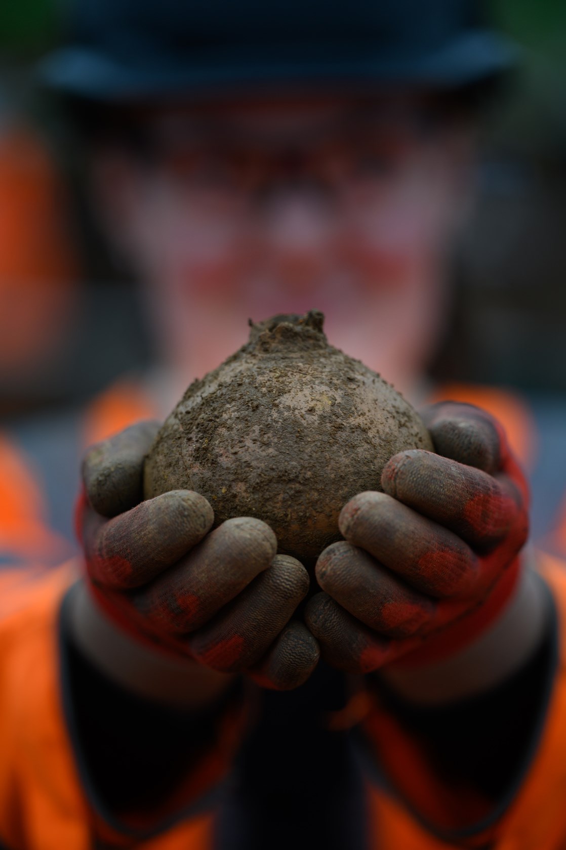 Roman pot uncovered at the archaeological excavation of a Roman trading settlement, Blackgrounds, South Northamptonshire-3: Archaeologist holding a Roman pot uncovered during the archaeological excavation of a wealthy Roman trading settlement, known as Blackgrounds, in South Northamptonshire. 

Tags: Archaeology, Roman, Northamptonshire, Phase One, History, Heritage