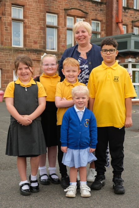 Headteacher Gillian Campbell with children from Hurlford Primary and ECC