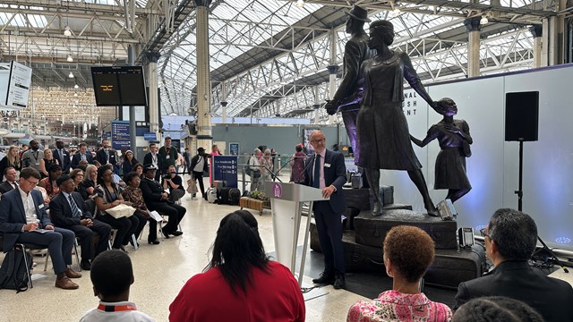 Network Rail celebrates the 75th anniversary of Windrush at London Waterloo station: Network Rail Chief Executive Andrew Haines addresses event guests