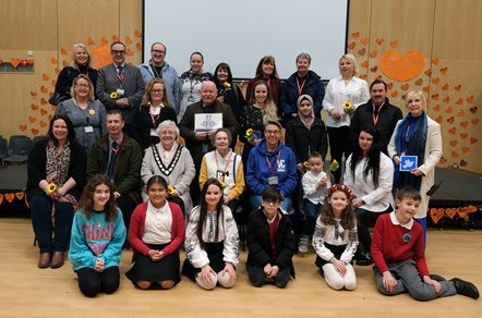 Pembroke Dock Community School Teachers and pupils in group having been awarded School of Sanctuary