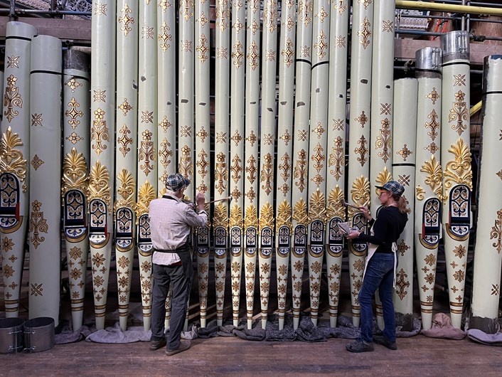 Leeds Town Hall organ pipes renewal: Specialist artists, Robert Woodland MBE and Debra Miller of The Upright Gilders, have taken on the painstaking task of recreating the spectacular appearance the organ pipes had when the iconic building’s Victoria Hall hosted the queen and other dignitaries for its opening night in 1858.