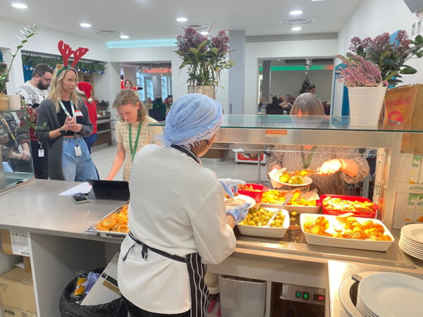 BristolChristmas2024-chef: Chef Abby with volunteers Anna, Eleanor and Tracey