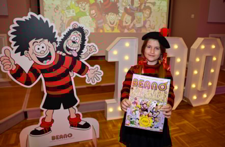 One of the first visitors to the National Library of Scotland's 100th birthday celebrations (7 August) where the Library was giving away special centenary editions of Beano. Credit: Neil Hanna