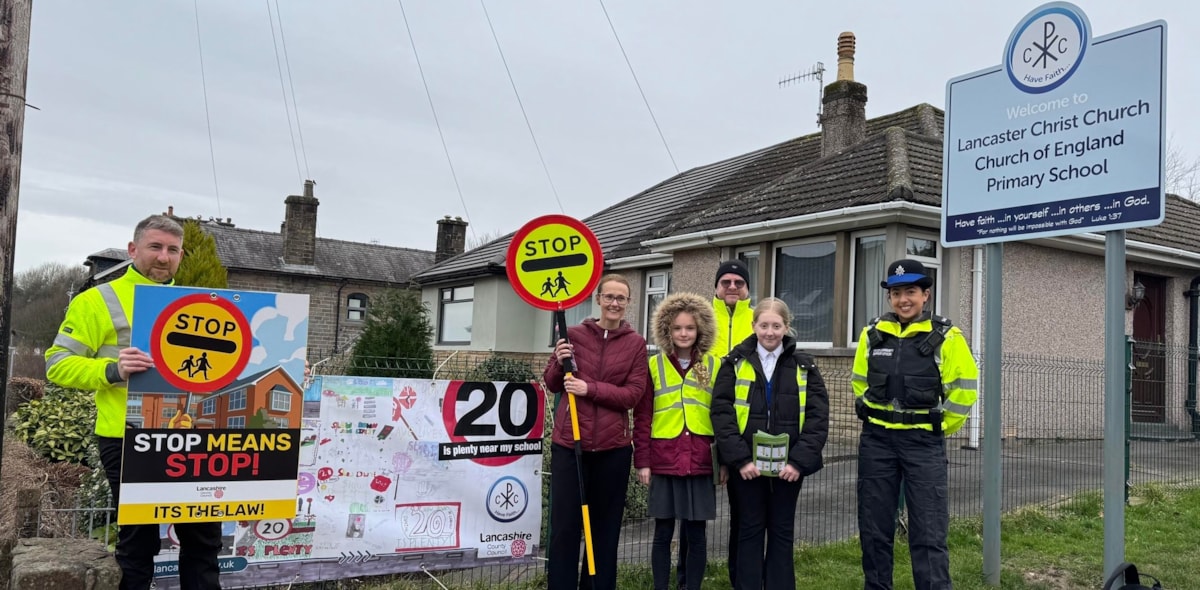 MP Cat Smith with pupils from Lancaster Christ Church Primary School, Lancashire County Council road safety team members Mark Graham and Hamish Clough and a PCSO on the day of action in Lancaster