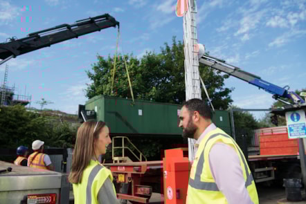 Kayleigh Ingham and Andrew Cullen look on as the fuel tank is removed 1