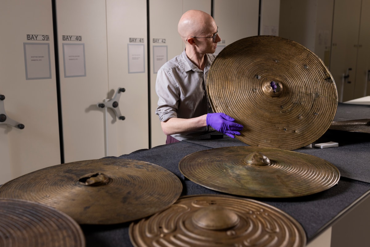 National Museums Scotland curator Dr Matthew Knight with the Bronze Age shields. Photo © Duncan McGlynn (9)
