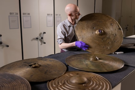 National Museums Scotland curator Dr Matthew Knight with the Bronze Age shields. Photo © Duncan McGlynn (9)