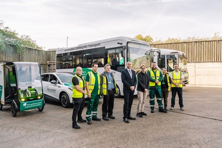 Staff at the Waste and Recycling Centre pose with Cllr Champion and Tony Ralph, Islington's Director Environment and Commercial Operations, in front of a range of electric vehicles