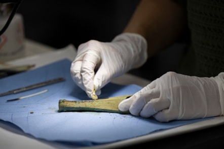 Conservator Bethan Bryan works on the Peebles Hoard. Photo © Duncan McGlynn (3)