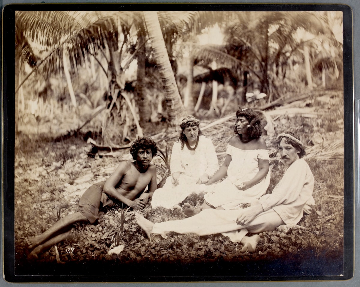 Photograph of Robert Louis Stevenson and his wife Fanny in Butaritari, Gilbert Islands, with local people, c. July 1889.