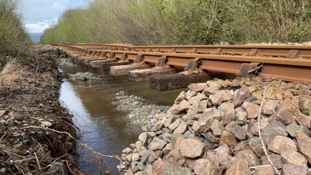 Conwy Valley Line in North Wales expected to reopen on Saturday after flood damage: Picture from near Dolgarrog station on the Conwy Valley Line after river flooding washed away ballast on 9 April 2024-3