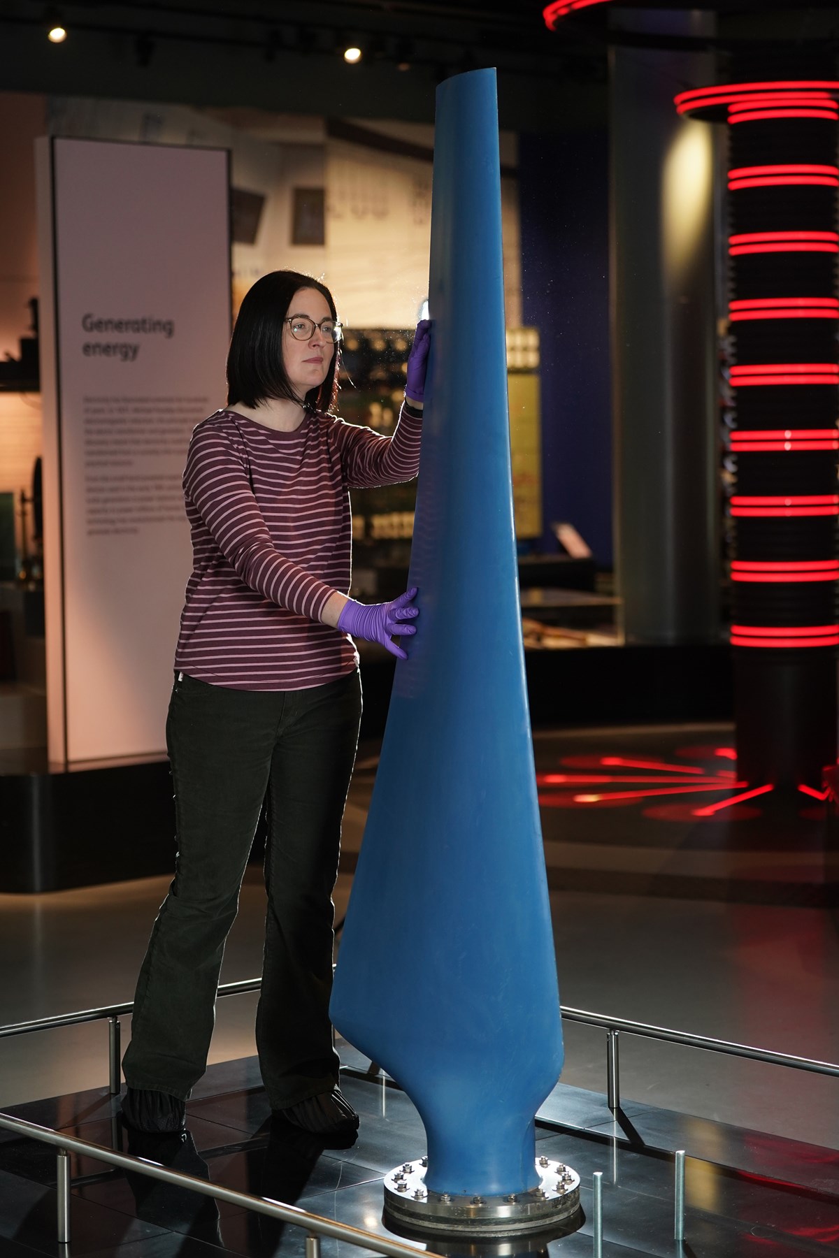 Curator Ellie Swinbank installs the Nova tidal turbine blade at the  National Museum of Scotland. Image © Stewart Attwood (1) | National Museums  Scotland News