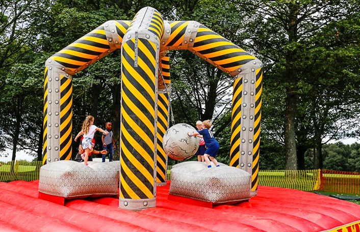 The Demolition Ball is just one of the various inflatables that children and young can expect to find at Breeze in the Park events.