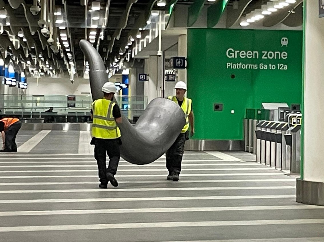 Team from Artem carrying in one of Ozzy's horns to Birmingham New Street station