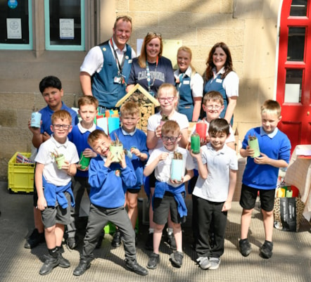Avanti West Coast staff at Carlisle celebrate World Bee Day with Year 3 pupils from Robert Ferguson Primary School