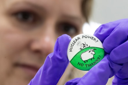 Lydia Messerschmidt, Artefact Conservator at National Museums Scotland prepares 1980s protest badges for display. Image (c) National Museums Scotland (27)