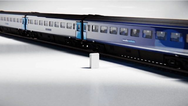 Image of signalling cabinet and train: Image of signalling cabinet and train