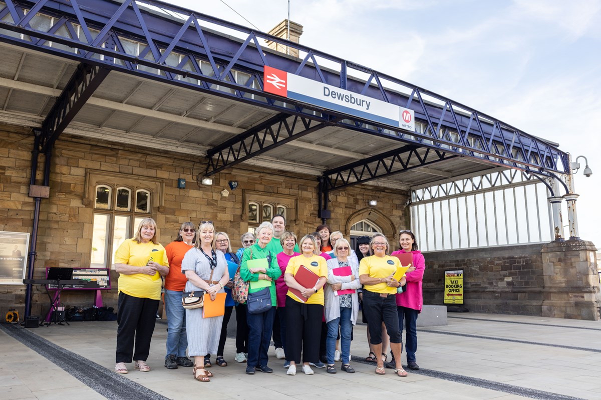 Dewsbury community choir outside of Dewsbury Station