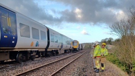 Image shows derailed Northern train near Grange-over-Sands