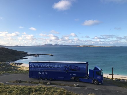 Screen Machine on Eriskay, Barra in distance