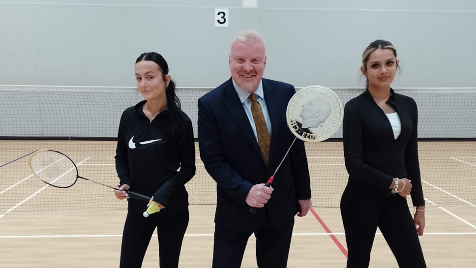 Left to right Ellie Reed, Cllr Corfield and Isobel Bearman play Badminton at Duncan Edwards Leisure Centre