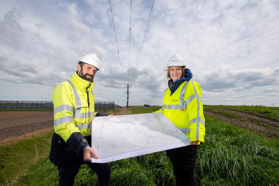 Electricity North West's Ben Fiddler with Katherine Fletcher MP