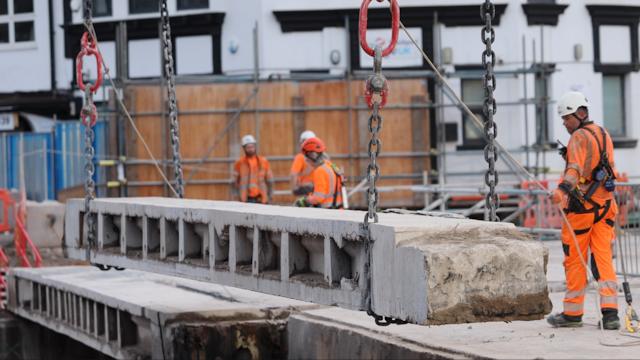 Murphy team lifting out a beam part: Murphy team lifting out a beam part