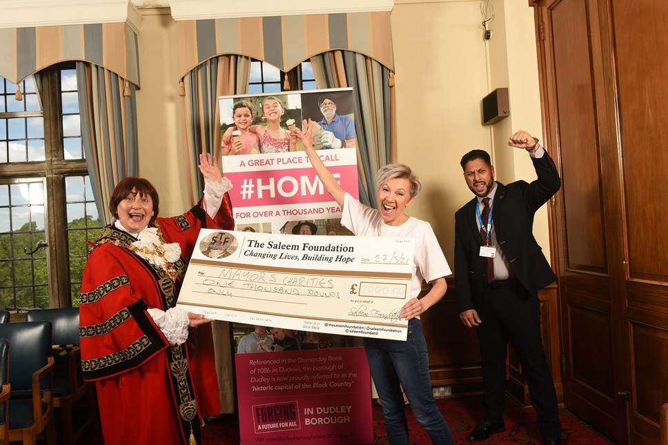 Mayor is given charity donation