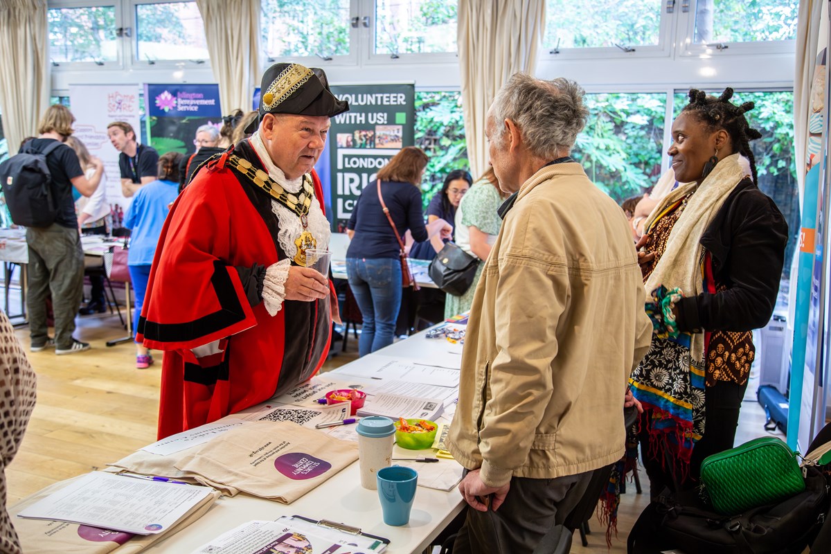The Mayor of Islington attending a previous volunteering fair in ceremonial robes