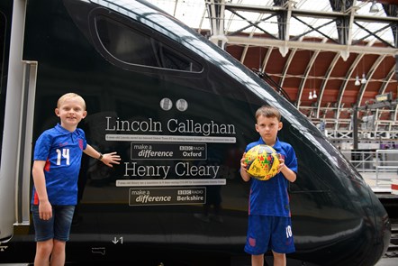 BBC Make A Difference Superstars Henry Cleary, eight, left, and Lincoln Callaghan, six, have become the youngest to have their names on the side of a train