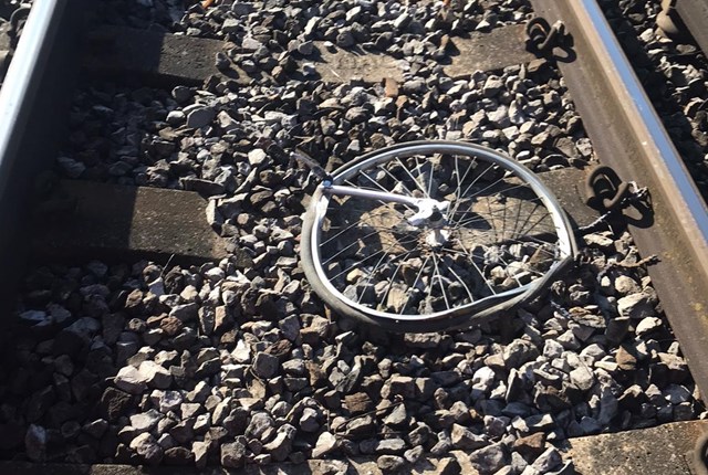 Bicycle hit by train