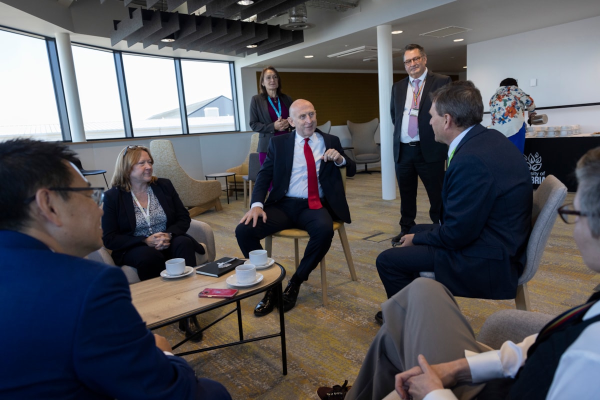 Visiting the University of Cumbria Barrow campus, Secretary of State for Defence, the Rt Hon John Healey MP, (centre) meets members of staff from the university's Institute of Business, Industry and Leadership as well as Vice Chancellor Professor Julie Mennell and Deputy Vice Chancellor Professor Br