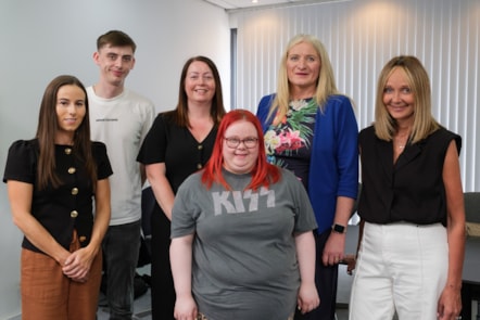 Linda McAulay-Griffiths and Margorie Harvie with the SL33 team