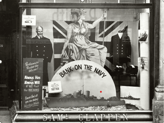 The window of Sam Clappen’s shop in Cricklade Street decorated for Warships Week in 1942 