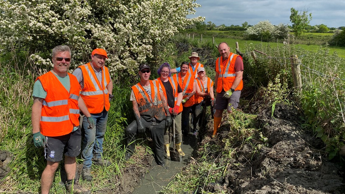 Network Rail volunteers after clearing canal feeder channel in Rugby copy
