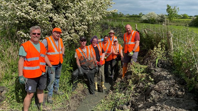 Railway staff swap tracks for towpaths for Rugby canal repairs: Network Rail volunteers after clearing canal feeder channel in Rugby copy