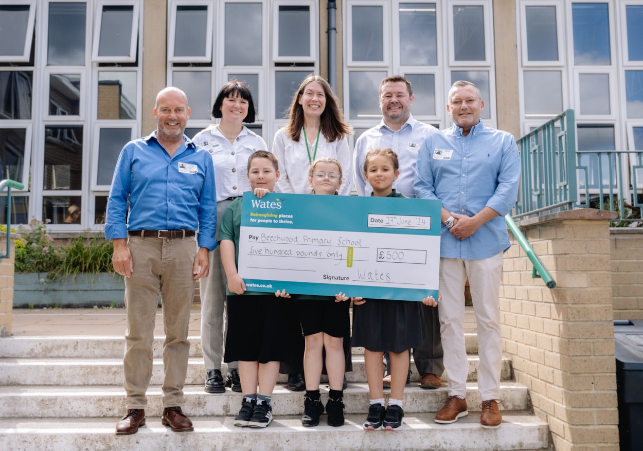 School 3: Beechwood Primary School pupils Oliver Doherty, Summer Beetham and Katana Maynard with, left to right, Damian Quarmby, Leah Larkin (Wates), Sarah Lanforth (Beechwood headteacher), Alan Neal (Wates) and Darren Quarmby. Credit: SAZ Media and Wates.