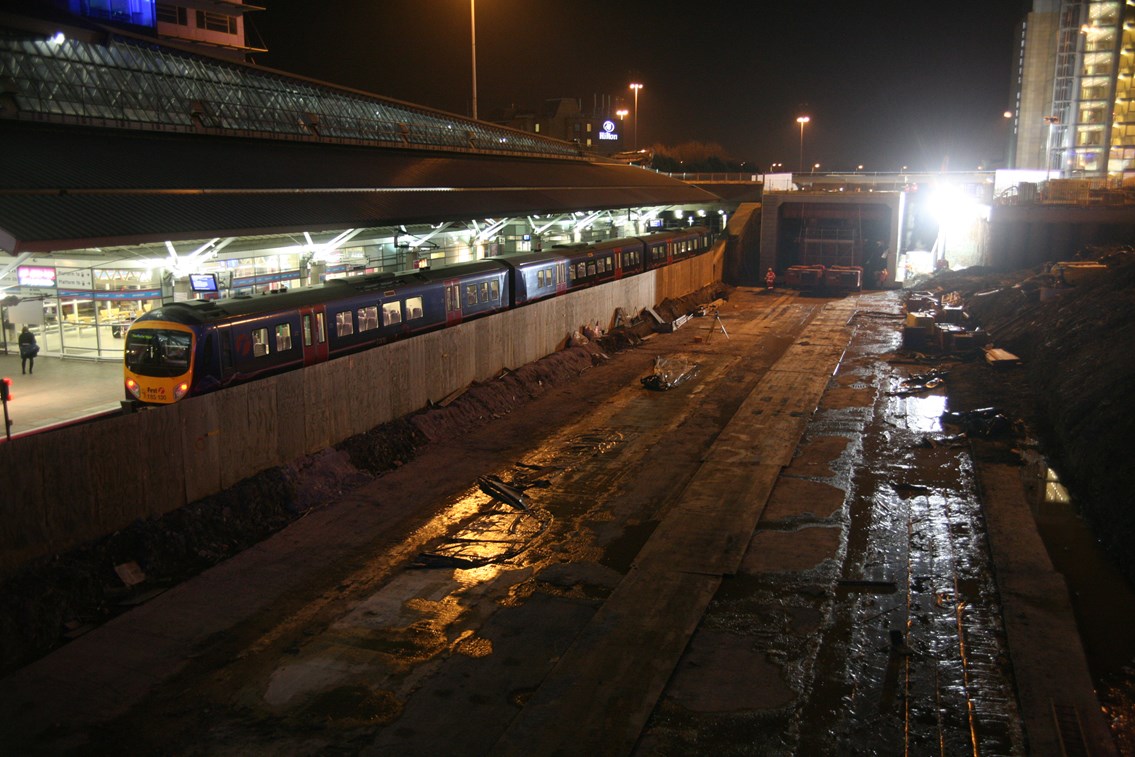 Manchester Airport bridge slide: The new bridge under Outwood Lane is nearly in place, showing where it was constructed alongside the station platforms.