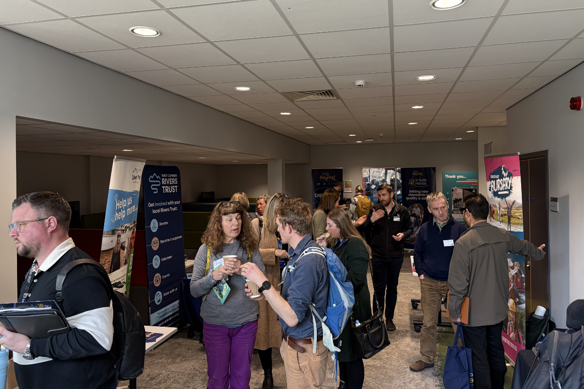 Attendees chatting during the conference held at the University of Cumbria's Lancaster campus