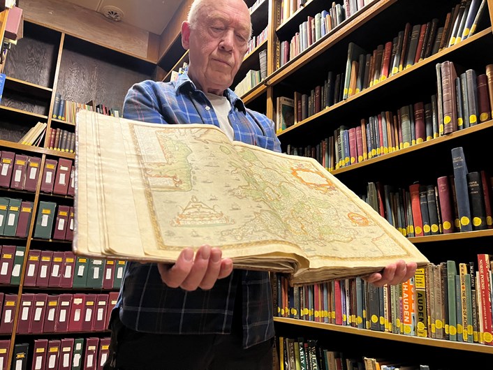 Saxton's Atlas: Philip Wilde, library assistant at Leeds Central Library with the atlas. Saxton’s Atlas, which he dedicated to Queen Elizabeth II, was completed in 1578 and after it was published the following year, it became the foundation for all subsequent county maps for more than a century after.
In fact Saxton’s Atlas was not fully replaced as the definitive geographical representation of England and Wales until Ordnance Survey began publishing one-inch maps in 1801.