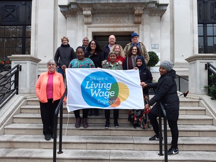 Staff at Islington Town Hall, all paid at least the London Living Wage, mark Living Wage Week with Islington councillors on the Town Hall steps.