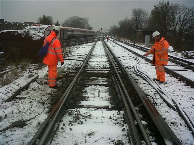 Snow forecast: Yorkshire rail passengers advised to check before you travel: Snowmen checking points heaters