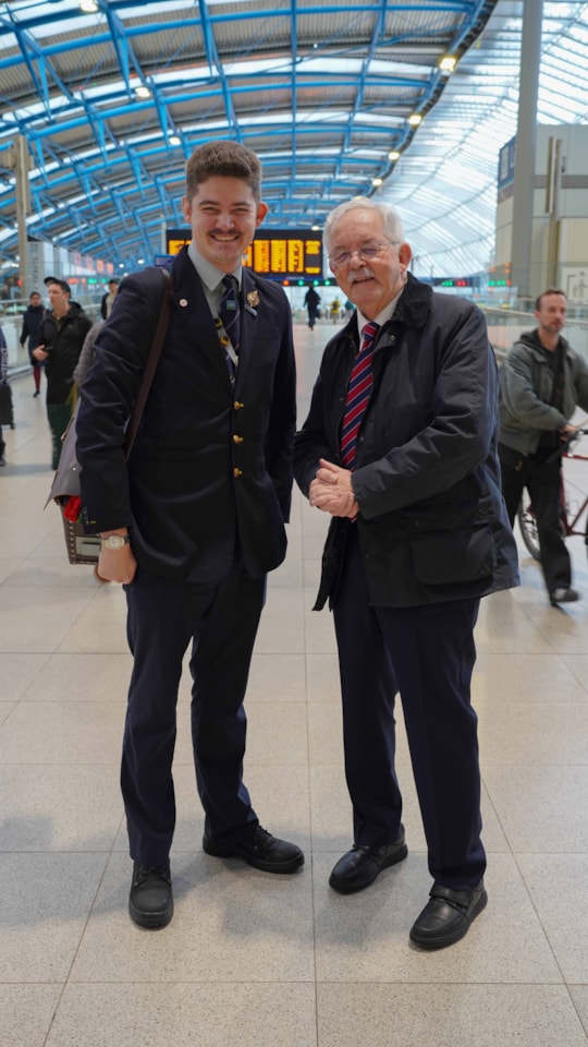 L to R: Andrew and Mike Lamport at Waterloo station (portrait)