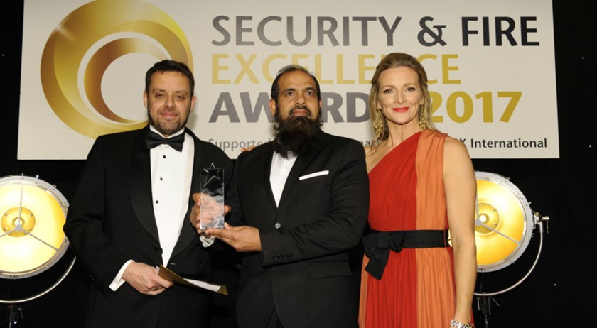 Muhammad Fahim, centre, picks up the 'Security Manager of the Year' award.