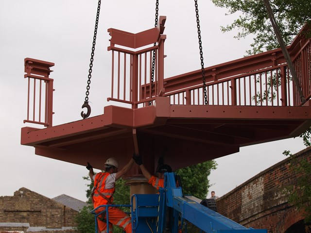 NORTH COTSWOLD REDOUBLING COMPLETES FIRST STAGE OF WORK: Charlbury footbridge lifted in