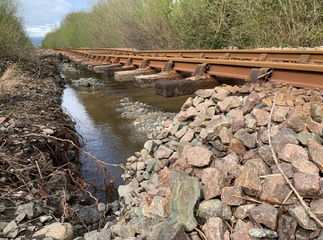 Picture from near Dolgarrog station on the Conwy Valley Line after river flooding washed away ballast on 9 April 2024-3