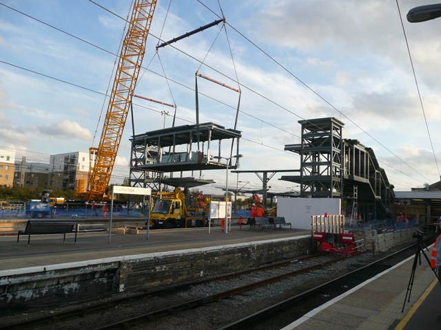 New footbridge for Cambridge: The footbridge connecting the new island platform (platforms 7 and 8) at Cambridge to the existing station was lifted in on Sunday 25 September 2011.